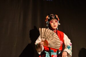 Chunxiang, the mischevious handmaiden, with the teacher's fan