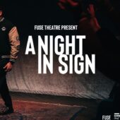 Poster for A Night in Sign featuring a full length photo of Nadeem Islam, a brown man with dark hair and glasses.