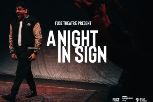 Poster for A Night in Sign featuring a full length photo of Nadeem Islam, a brown man with dark hair and glasses.